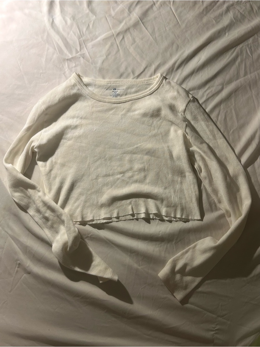 white brandy long sleeve cropped top